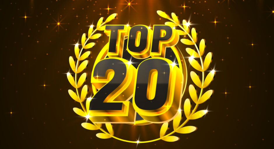Top 20 golden award emblem with laurel wreath on dark background